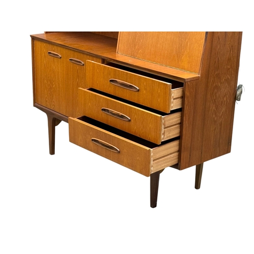 188 - Jentique, C.1960. A Teak Cocktail Sideboard. 138x42x128cm. 5