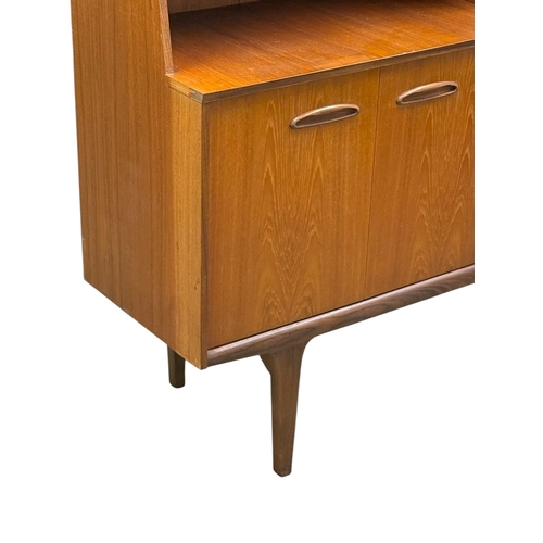 188 - Jentique, C.1960. A Teak Cocktail Sideboard. 138x42x128cm. 5