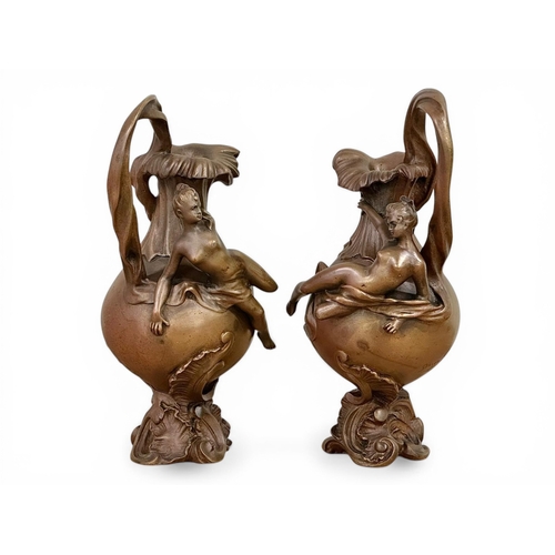 196 - Georges Charles Coudray (1862-1944) A Pair of Art Nouveau Bronze Ewer Form Sculptures. C.1900. 32cm.