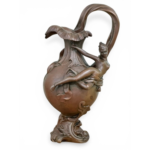 196 - Georges Charles Coudray (1862-1944) A Pair of Art Nouveau Bronze Ewer Form Sculptures. C.1900. 32cm.