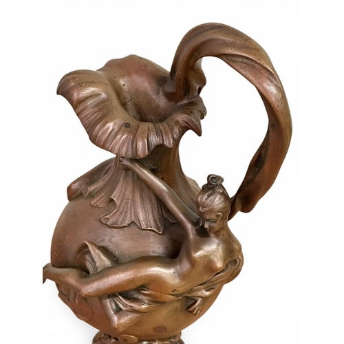 196 - Georges Charles Coudray (1862-1944) A Pair of Art Nouveau Bronze Ewer Form Sculptures. C.1900. 32cm.