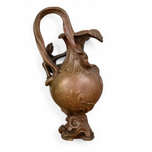 196 - Georges Charles Coudray (1862-1944) A Pair of Art Nouveau Bronze Ewer Form Sculptures. C.1900. 32cm.