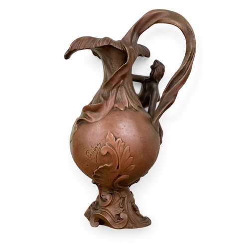 196 - Georges Charles Coudray (1862-1944) A Pair of Art Nouveau Bronze Ewer Form Sculptures. C.1900. 32cm.
