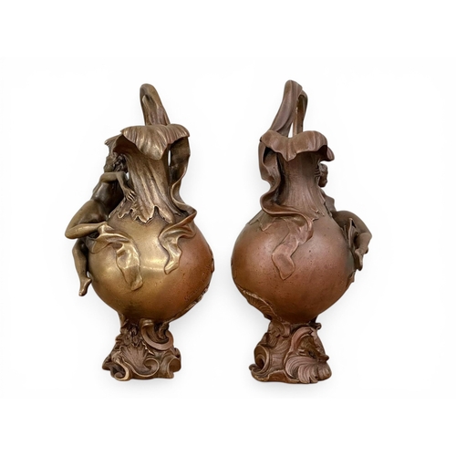 196 - Georges Charles Coudray (1862-1944) A Pair of Art Nouveau Bronze Ewer Form Sculptures. C.1900. 32cm.