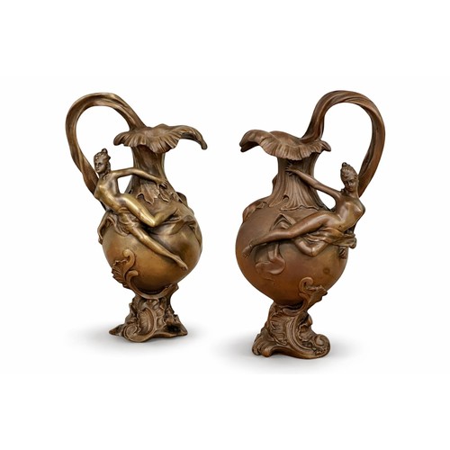 196 - Georges Charles Coudray (1862-1944) A Pair of Art Nouveau Bronze Ewer Form Sculptures. C.1900. 32cm.