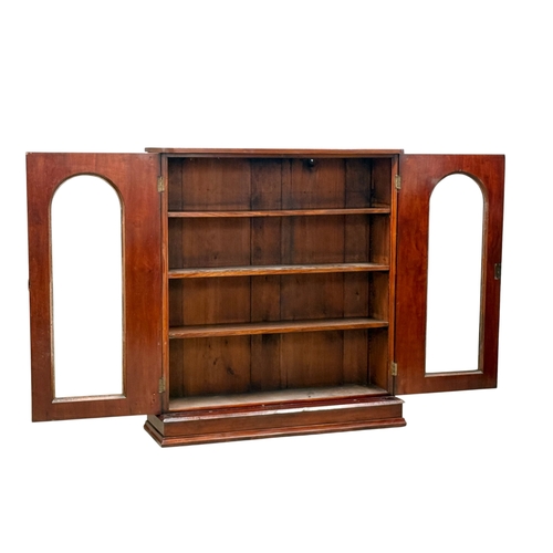 230 - A Victorian Mahogany Two Door Bookcase. 117x36x132cm.