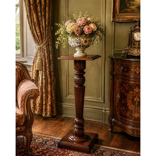 221 - A Regency Style Mahogany Torchiere. 40x101cm.