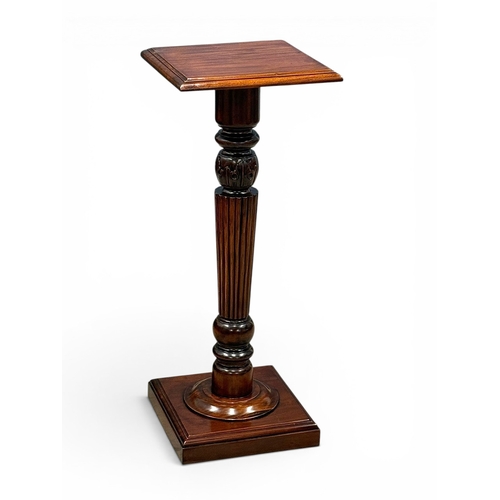 221 - A Regency Style Mahogany Torchiere. 40x101cm.