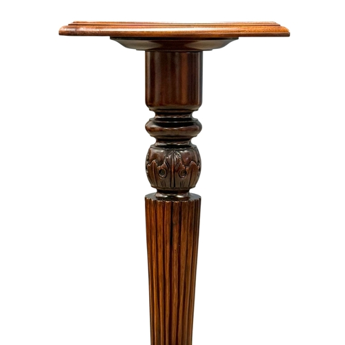 221 - A Regency Style Mahogany Torchiere. 40x101cm.