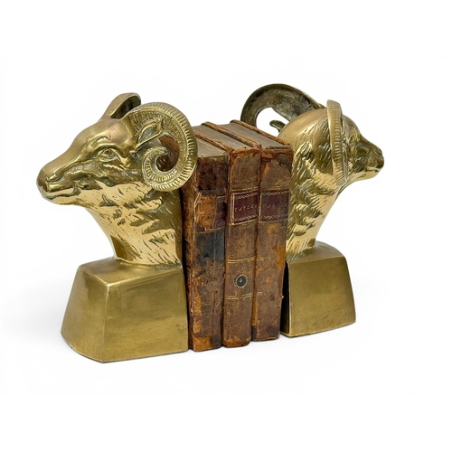 224 - A Pair of Brass Rams Head Bookends. Mid 20th Century. 12x10x18cm.