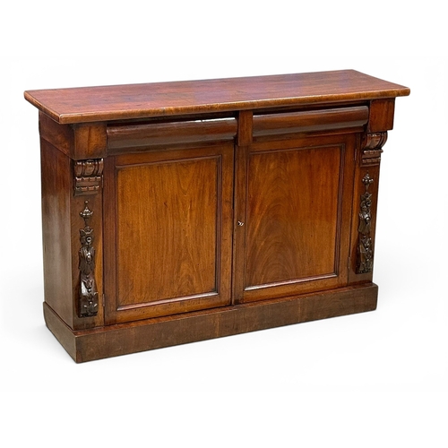 225 - A Victorian Mahogany Side Cabinet. C.1870, Late 19th Century. With Ogee drawer fronts and carved cor... 