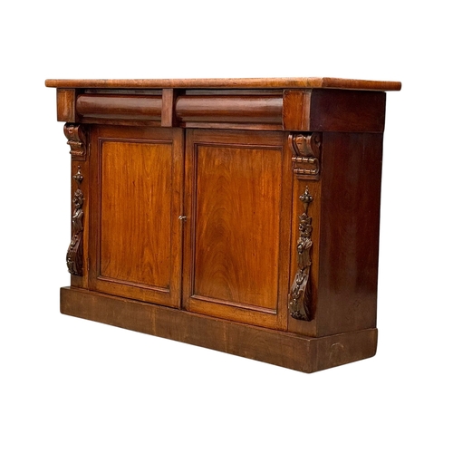 225 - A Victorian Mahogany Side Cabinet. C.1870, Late 19th Century. With Ogee drawer fronts and carved cor... 