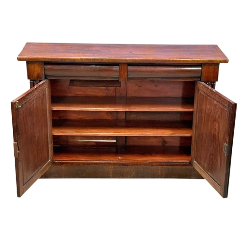 225 - A Victorian Mahogany Side Cabinet. C.1870, Late 19th Century. With Ogee drawer fronts and carved cor... 