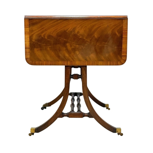 234 - A Quality Regency Style Mahogany Sofa Table with Rosewood Crossbanding. 93x60x73cm. Open 147x60x73cm... 