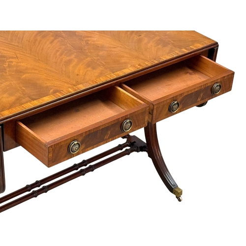 234 - A Quality Regency Style Mahogany Sofa Table with Rosewood Crossbanding. 93x60x73cm. Open 147x60x73cm... 