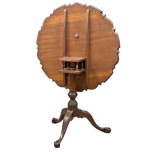254 - A Large Chippendale Style Mahogany Tilt Top Pedestal Table. 84x75cm.