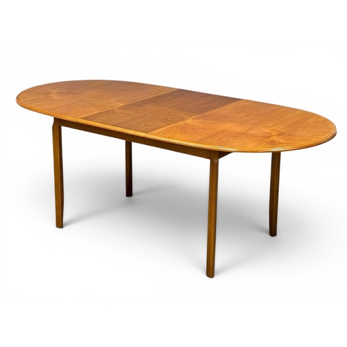 279 - A Teak Extending Dining Table and Six Chairs by Meredew. C.1970. 145x94x74cm. Open 188x94x74cm.