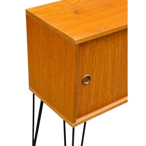 283 - A 1960’s Teak Side Cabinet on Hairpin Legs. 77x36x87cm.