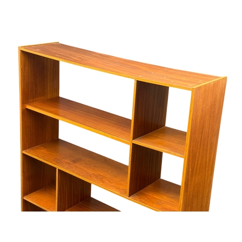 287 - A Teak Room Divider Bookcase. C.1960. 126.5x29.5x174.5cm.