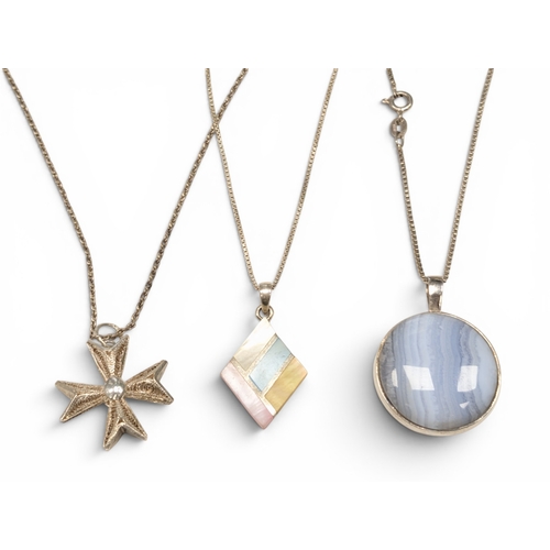 673 - 3 Silver Pendants & Chains
