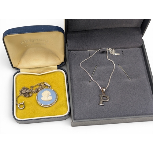 685 - 2 Silver Pendants & Chains