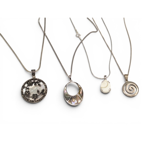 691 - 4 Silver Pendants & Chains