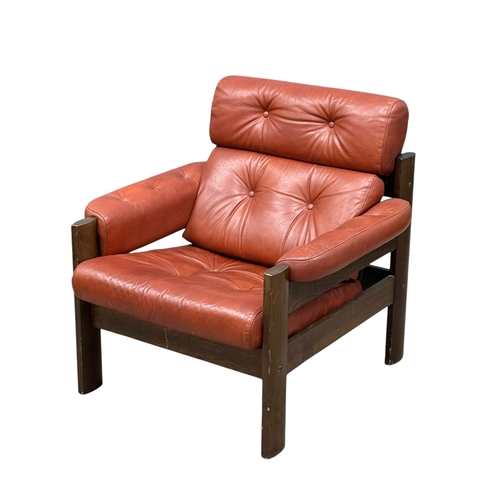 177 - A Norwegian Leather “Amigo” Armchair by Ekorness.
