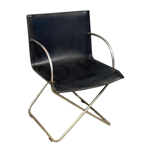 183 - A Set of Four Leather and Chrome Dining Chairs. Designed by Niels Gammelgaard for Cappellini. C.1985... 