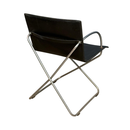 183 - A Set of Four Leather and Chrome Dining Chairs. Designed by Niels Gammelgaard for Cappellini. C.1985... 