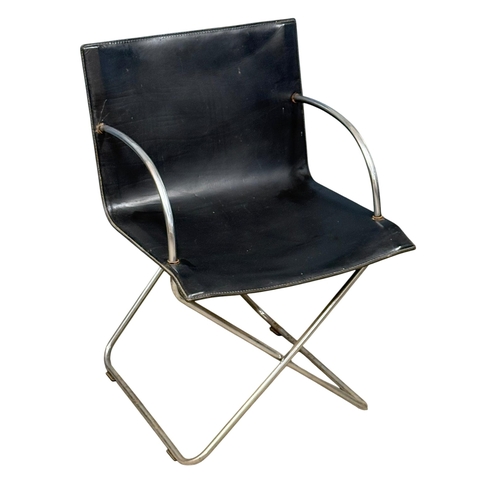183 - A Set of Four Leather and Chrome Dining Chairs. Designed by Niels Gammelgaard for Cappellini. C.1985... 
