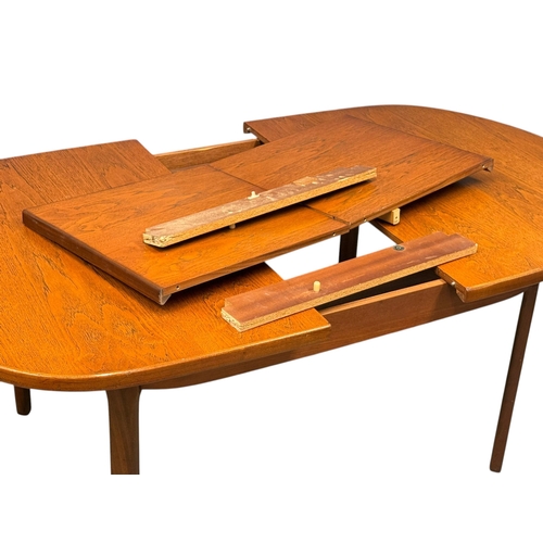 189 - A Teak Dining Table and Six Chairs by Elliots of Newbury. C.1970. 153x107x71.5cm.