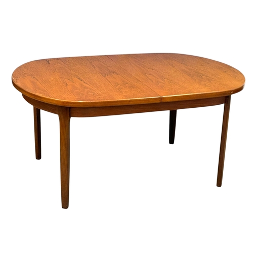 189 - A Teak Dining Table and Six Chairs by Elliots of Newbury. C.1970. 153x107x71.5cm.