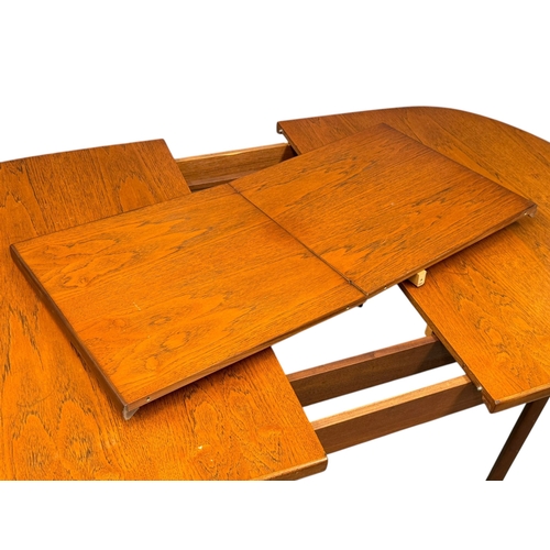 189 - A Teak Dining Table and Six Chairs by Elliots of Newbury. C.1970. 153x107x71.5cm.
