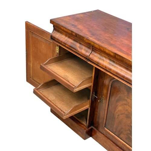 193 - A Victorian Mahogany Sideboard. C.1860-70, 19th Century. Three drawers over three panels doors and f... 