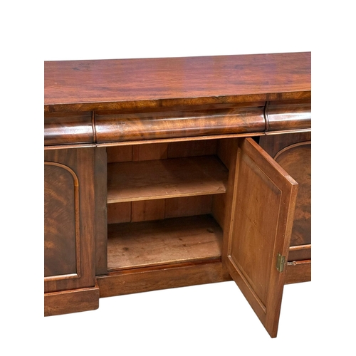 193 - A Victorian Mahogany Sideboard. C.1860-70, 19th Century. Three drawers over three panels doors and f... 