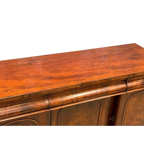193 - A Victorian Mahogany Sideboard. C.1860-70, 19th Century. Three drawers over three panels doors and f... 