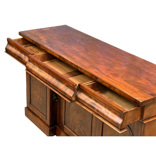 193 - A Victorian Mahogany Sideboard. C.1860-70, 19th Century. Three drawers over three panels doors and f... 
