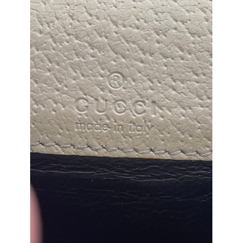 81 - Gucci Coin Purse