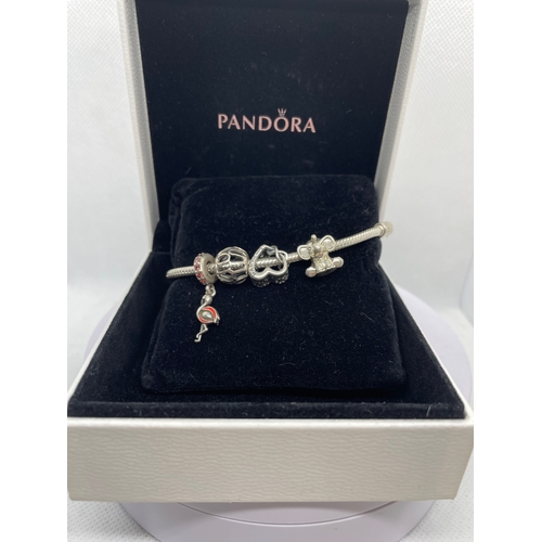 100 - Pandora bracelet with charms