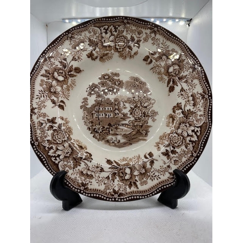 62 - A  Royal Staffordshire Tonquin pattern  Brown  dinner plate designed by Clarice Cliff