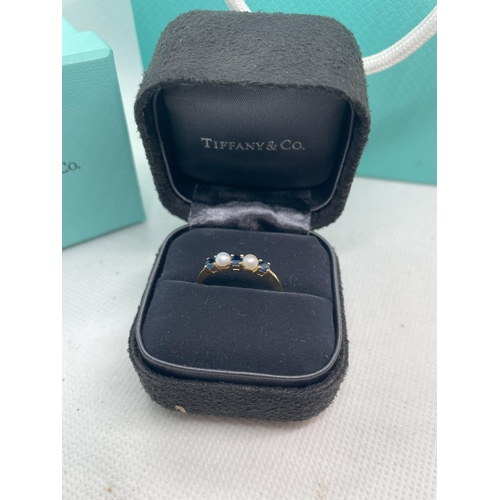 100 - Tiffany & Co 18ct sapphire & pearl ring