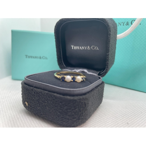 100 - Tiffany & Co 18ct sapphire & pearl ring