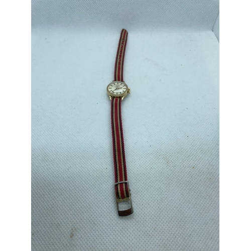 113 - Avia 9ct gold watch