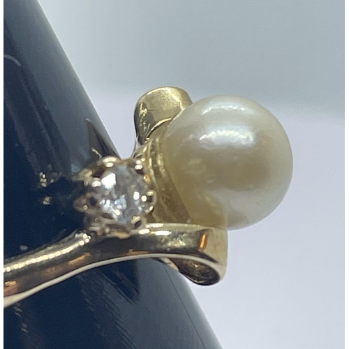 16 - 9ct pearl & diamond ring