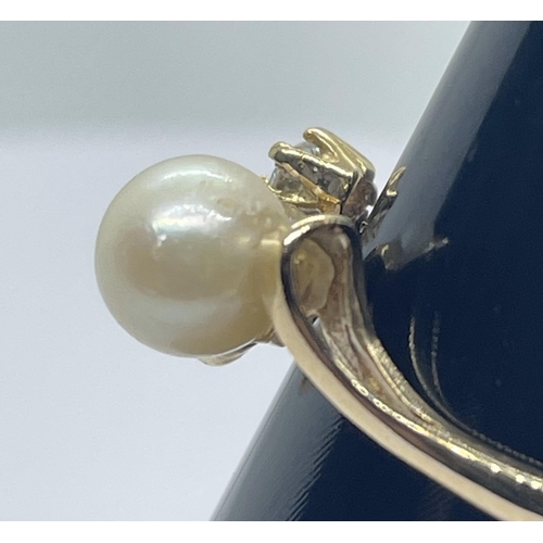 16 - 9ct pearl & diamond ring