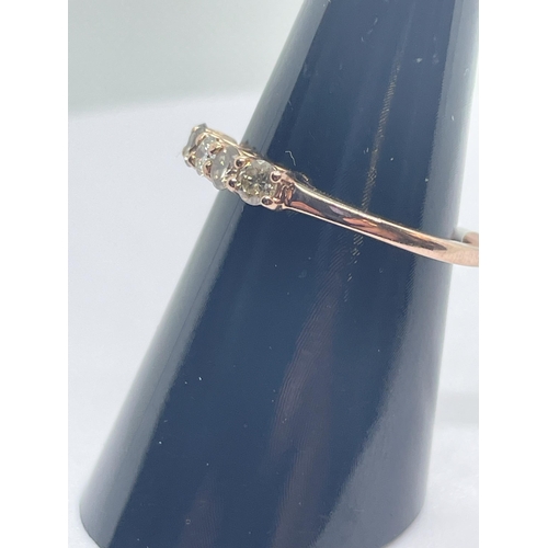 27 - 9ct rose gold 5 stone diamond ring