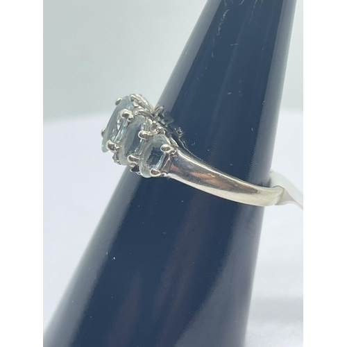 28 - 9ct aquamarine & diamond ring