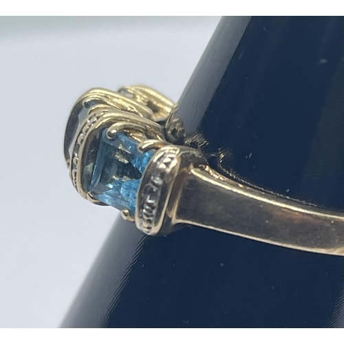 30 - 9ct topaz and diamond ring