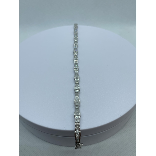 84a - 7.5ct diamond tennis bracelet set in 18ct white gold.