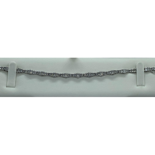 84a - 7.5ct diamond tennis bracelet set in 18ct white gold.